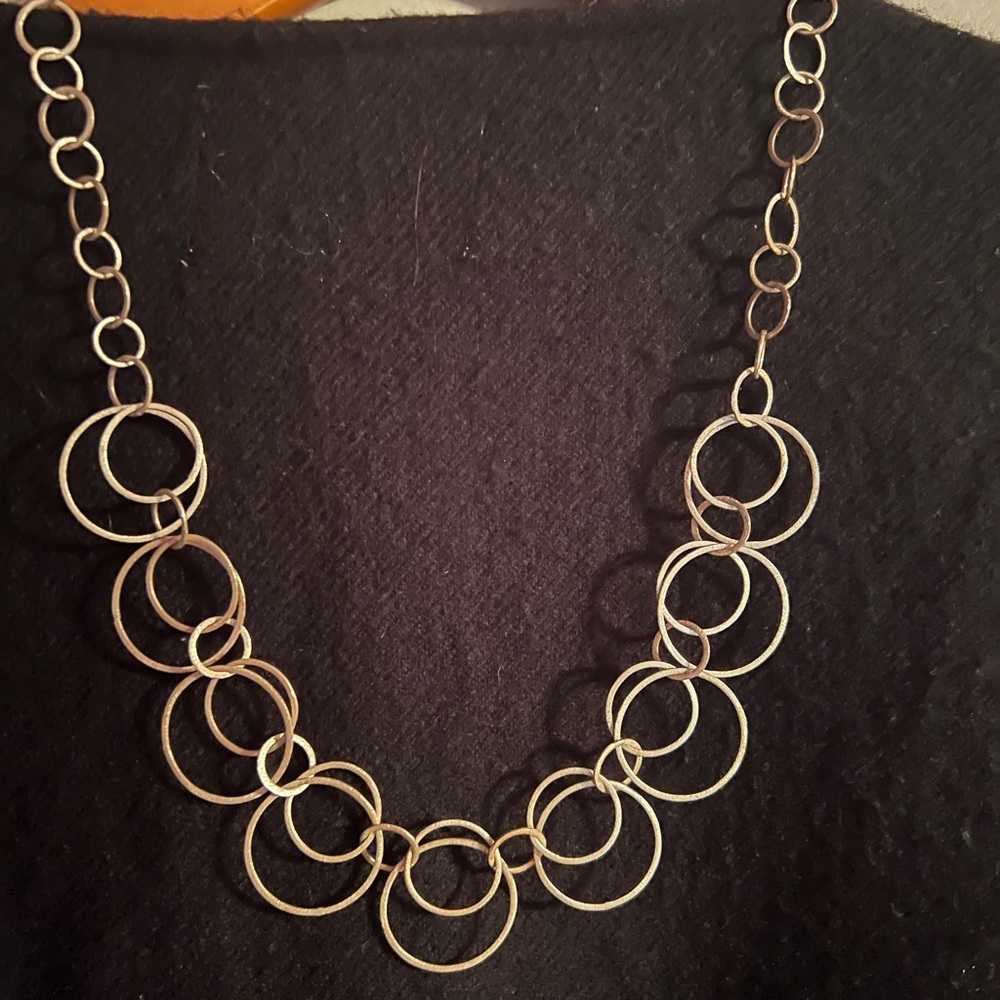 Vintage and retired Stella and Dot silver interlaced hoop necklace